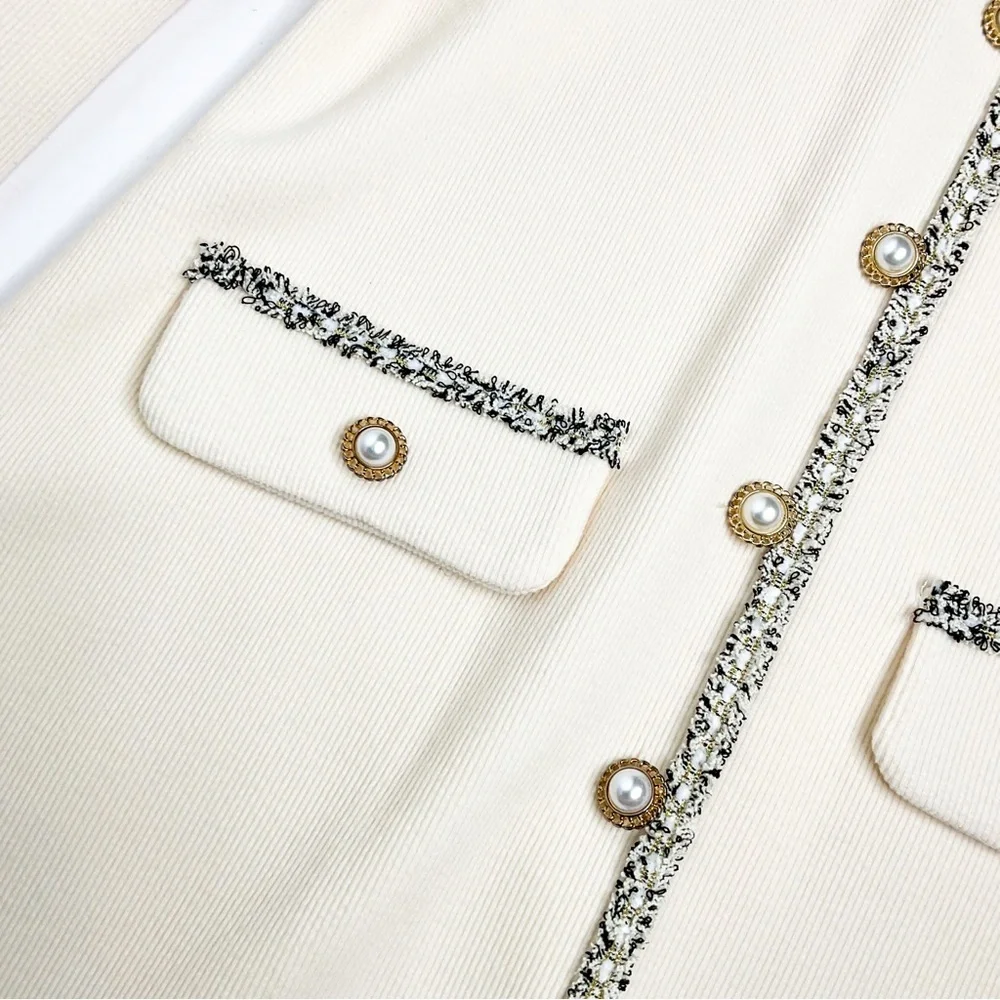 Elegant Cream Dress with Black Bow & pearl details - Picture 10 of 11